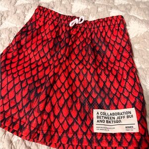 BKTSQD collab with Jeff Bui Red and Black Snake Print Shorts